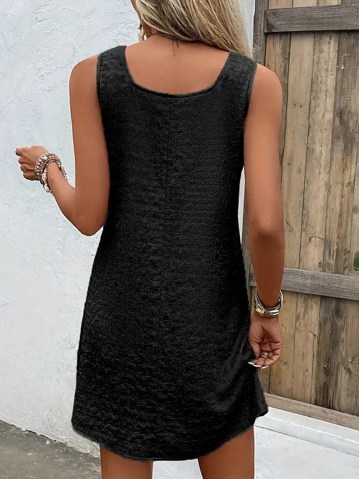 SLEEVELESS DRESS WITH ASYMMETRICAL COLLAR